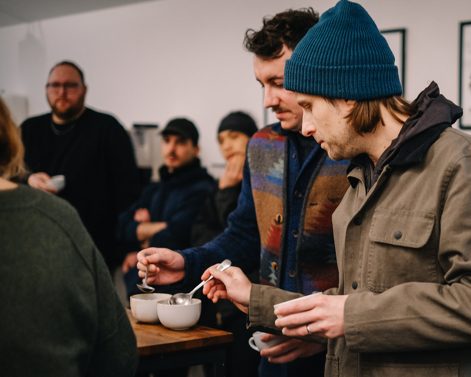 People taking part in a team coffee cupping.